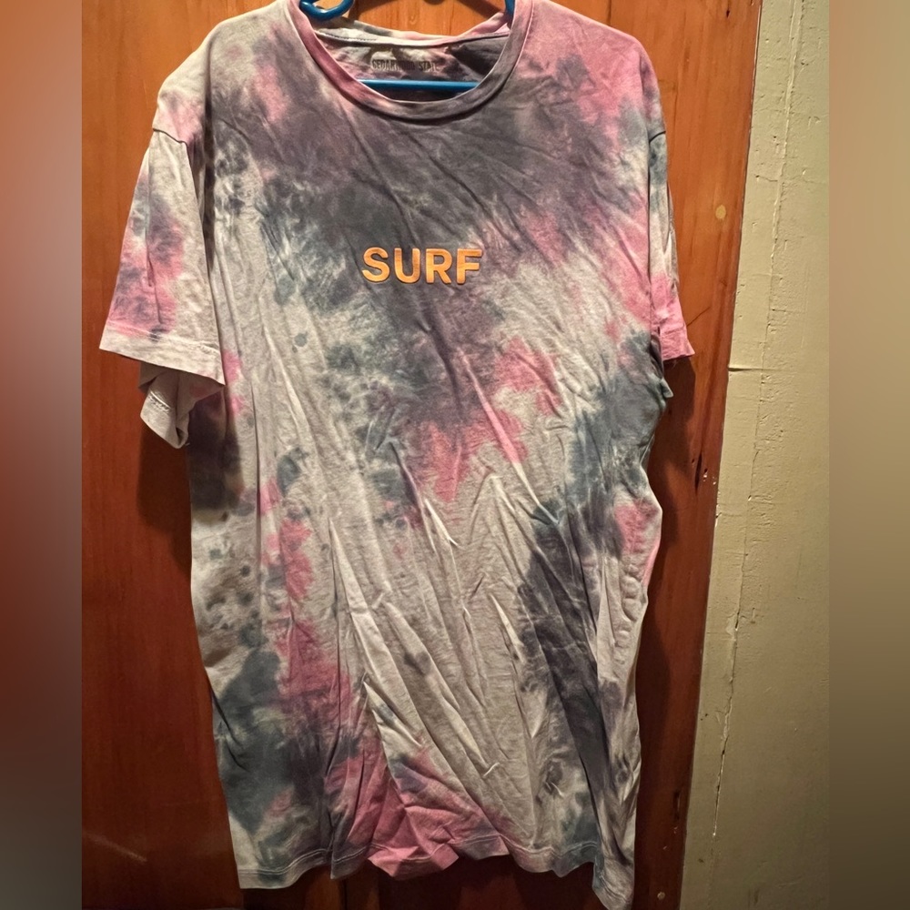 Size XS Tie Dye tee shirt with the word Surf logo